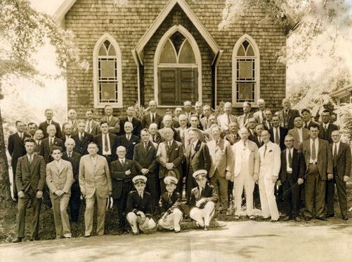 Old photo group of men in front of church