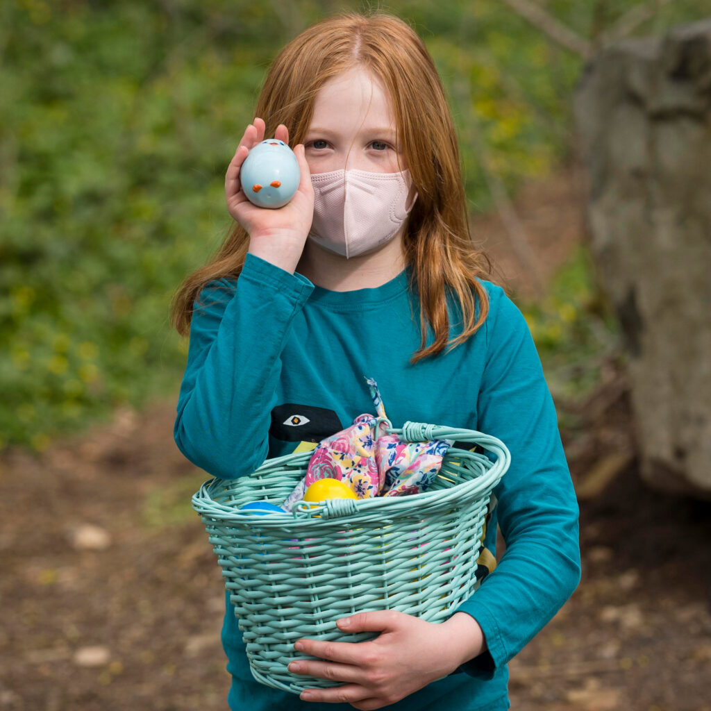 Girl holding Egg Basket